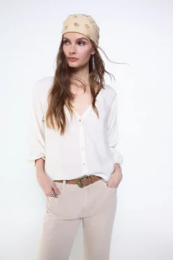 Blusa plisada fluida