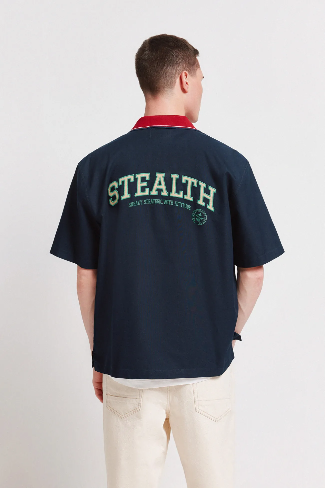 Camisa varsity manga corta