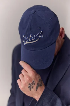 Gorra visera textil