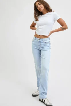 Jeans slim tiro medio