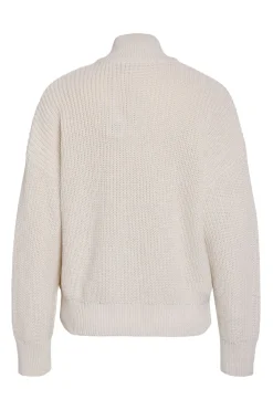 Jersey cuello alto cremallera bordado