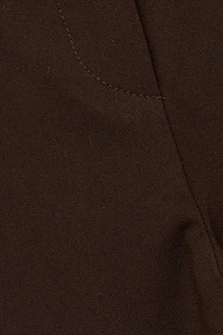 Pantal&oacute;n de tela con cintur&oacute;n