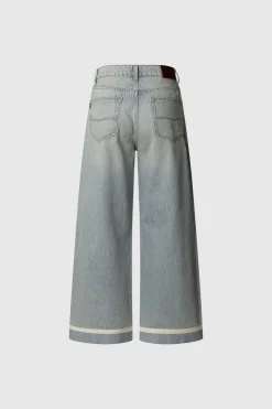 Pantal&oacute;n denim wide leg con detalle en el bajo