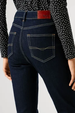 Pantal&oacute;n vaquero acampanado tiro alto