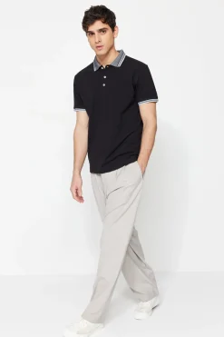 Polo detalle cuello y mangas