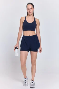 Short running deportivo reflectante