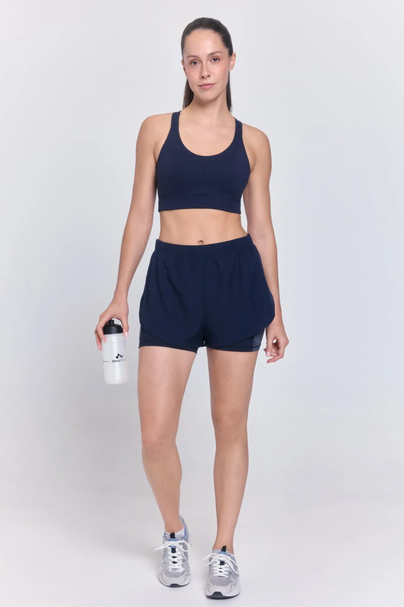Short running deportivo reflectante