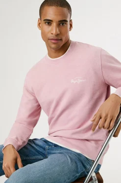 Sudadera lavada con logo pequeño frontal y logo grande en la espalda.